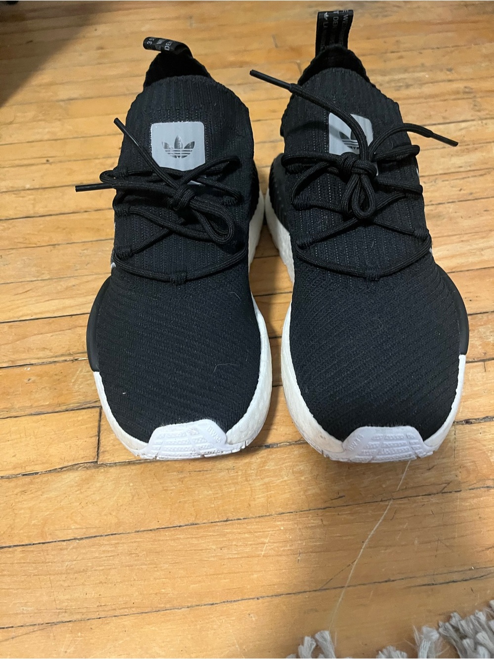 Adidas women’s Black and White Knit Slip-On Sneakers